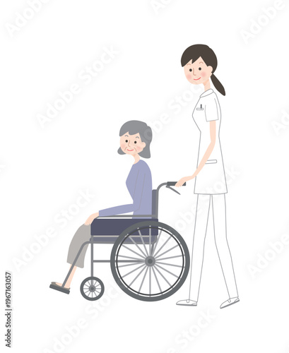 シニア女性の乗る車椅子を押す看護師