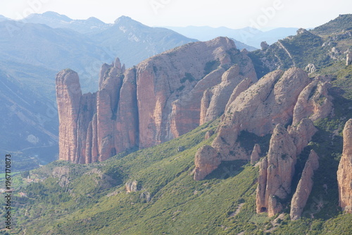 Mallos de Riglos rock formations in Huesca, Spain with dramatic cliffs and blue sky