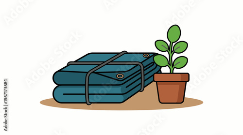 Neatly folded blue tarpaulins and a vibrant potted plant, representing the concept of readiness for gardening, home projects, or versatile outdoor protection