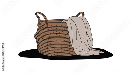 Traditional woven wicker laundry basket with a soft white linen cloth draped over its side, casting a subtle shadow on a clean white background.