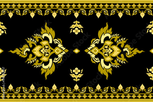 Thai art pattern.
Native Thai ethnic pattern, seamless design, painted with gold, yellow, and red colors on a black background. Suitable for wallpaper, walls, temple wallpaper, carpets, and clothing.