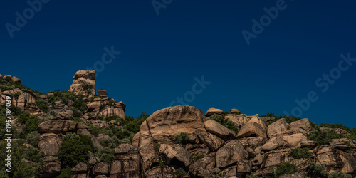 Photography Rocky Landscape with Boulder Formations Against Clear Blue Sky