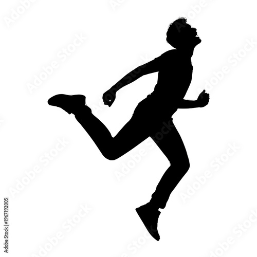 A silhouette of a man joyfully leaping.