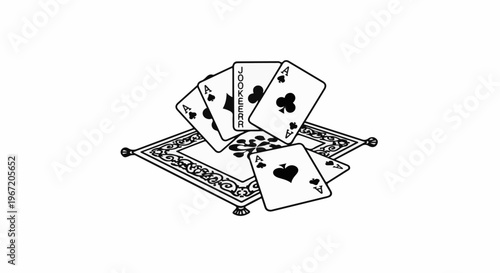 Playing cards, including a joker, are displayed on a patterned mat