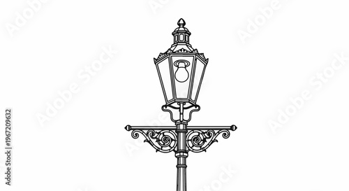Ornate vintage lamp post with detailed scrollwork and a glowing bulb