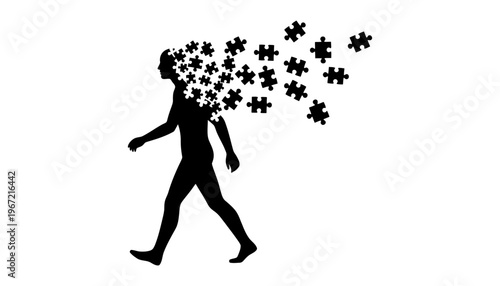 A man silhouette with puzzle pieces coming out of his head