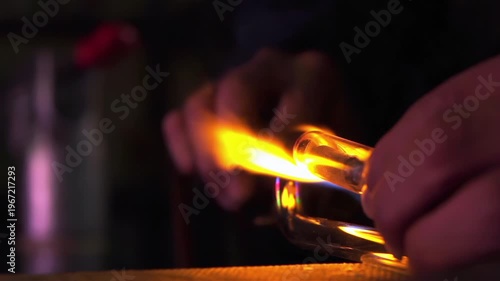 Neon Glass Tube Being Heated by Moving Blowtorch in Workshop, Close Up - 4K