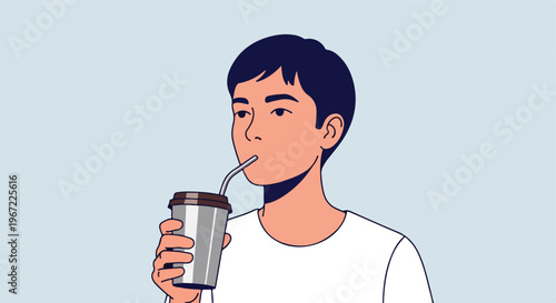A young man holding a disposable cup and drinking a beverage through a straw