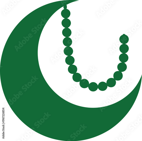 Green crescent moon symbol with rosary beads hanging from it indoors