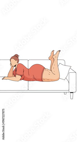 A plus-size woman in a red dress lies on her stomach on a couch, relaxing at home