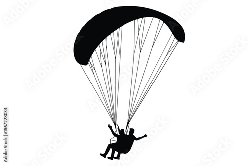 Silhouette of a paraglider and pilot soaring through the open sky