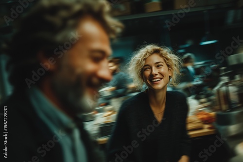 Coworkers Laughing Together in Messy Modern Office Kitchen, Two Adults Sharing a Moment