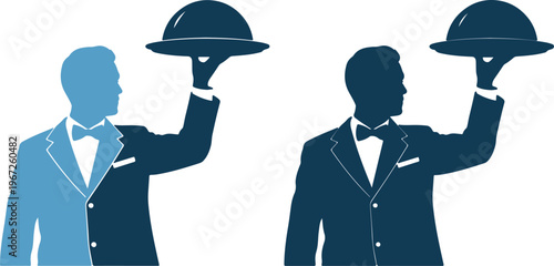 Two waiters in tuxedos holding covered dishes
