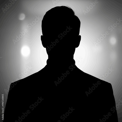 Silhouette of a Man in a Suit Against a Light Background.