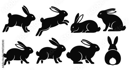 Black silhouettes of multiple rabbits running.