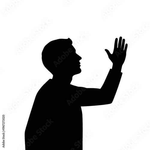 Silhouette of a man gesturing.