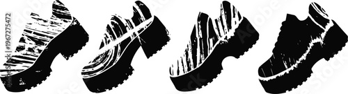 Four black vintage rubber stamps with wood handles in different angles isolated on white