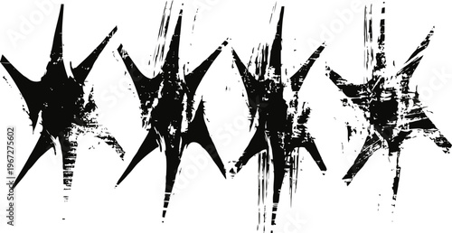 Abstract black grunge starburst shapes with spiky elements on white background