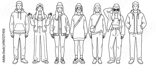 Group of young people in modern casual clothing poses together.