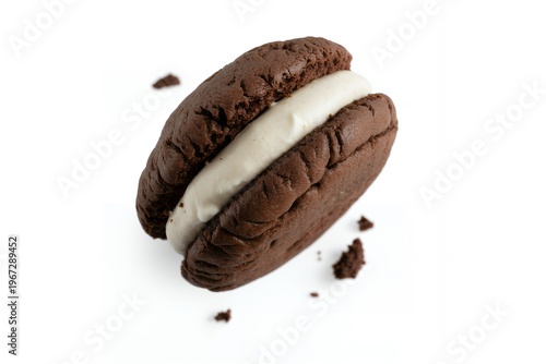 Chocolate whoopie pie with cream filling on white background chocolate cake
