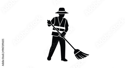 Street sweeper with a broom a stark black silhouette