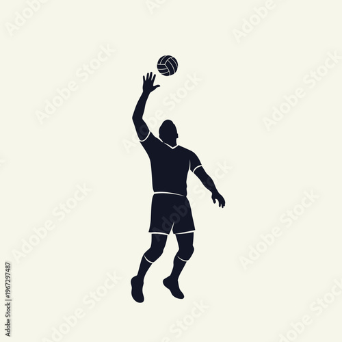 Silhouette of a volleyball player jumping to spike the ball during a match.