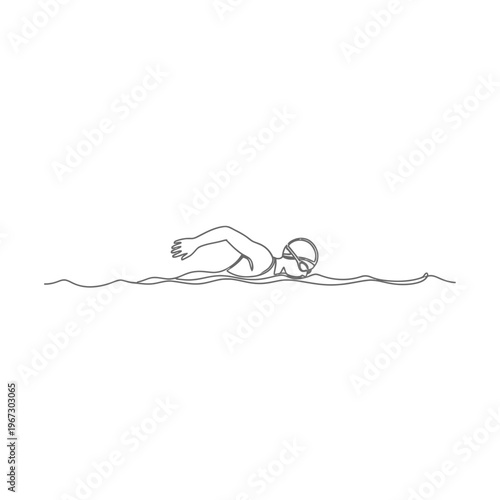 Swimmer in the water focused on the stroke swimming freestyle competition.