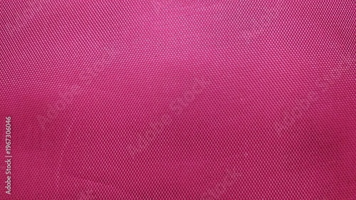 Abstract Magenta Textured Fabric Background with Gradient Light