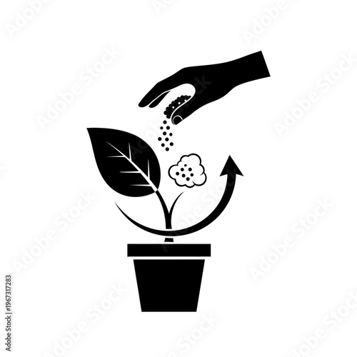 Hand fertilizing a plant in a pot promoting growth and nourishment for healthy development.