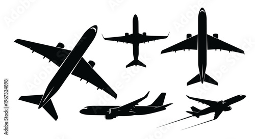 Set of various airplane silhouettes on a white background.