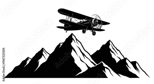 Biplane flying over majestic mountains in a classic black and white illustration.