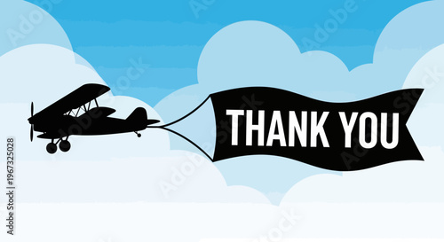 Biplane flying across blue sky pulling a thank you banner.
