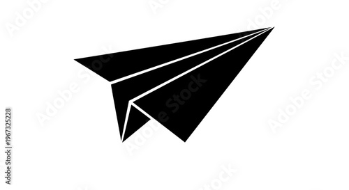 Black paper airplane flying through the air.