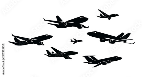 Silhouettes of various airplanes in flight, showcasing different models and sizes against a white background.