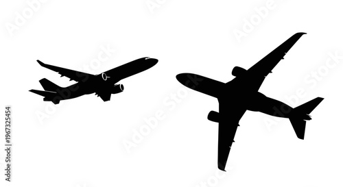Two airplane silhouettes flying against a clean white background.