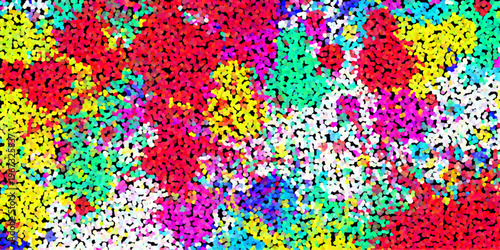 Colorful abstract mosaic of small dots in red yellow green blue and magenta on a black background creating a vibrant and textured pattern