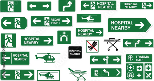 Green directional signs indicate hospital.