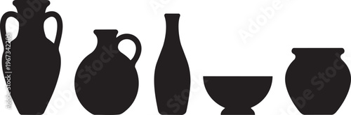 A collection of antique ceramic vases and brown clay jugs includes a porcelain milk pitcher and pottery jars isolated as decorative objects