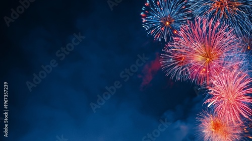 Fireworks Light up the Sky Over the American Flag During a Celebration in the...