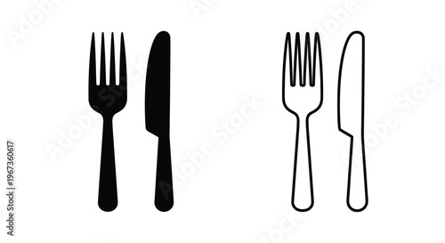 Black and white cutlery icons fork and knife a contrasting silhouette