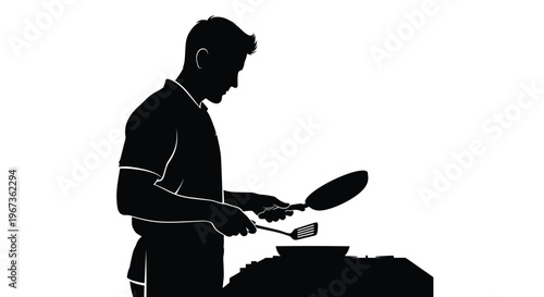 Man cooking with a pan and spatula a striking black silhouette