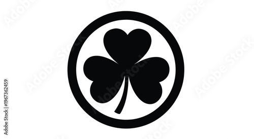 A black circular emblem featuring a four leaf clover silhouette