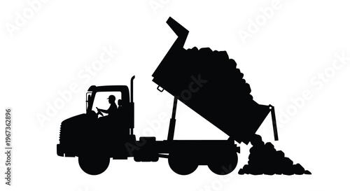 Dump truck unloading material a striking black shape silhouette