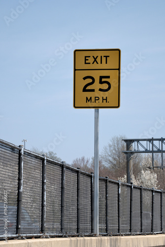 Highway exit speed limit sign. 25 miles per hour.