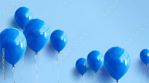 Blue Balloons Floating Against a Light Background During a Celebration