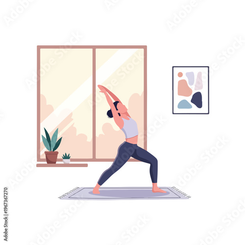 A woman practices yoga in a serene indoor setting with a window and artwork, wearing athletic attire on a mat.