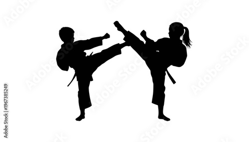 Karate silhouette of two people kicking each other in a fighting stance