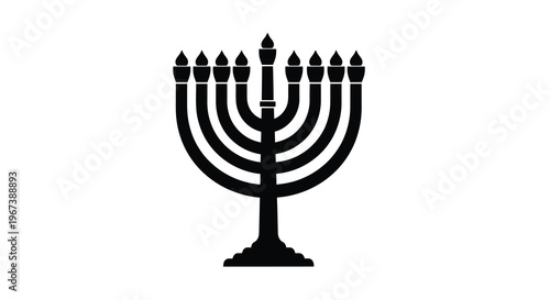 A simple black silhouette of a traditional hanukkah menorah on white