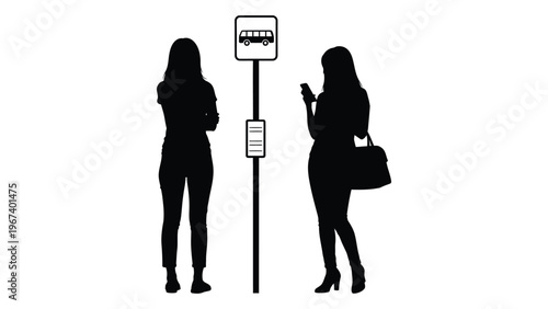 Two women wait at a bus stop one using a mobile phone in a black silhouette style