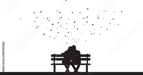 Silhouette of couple sitting on bench with confetti